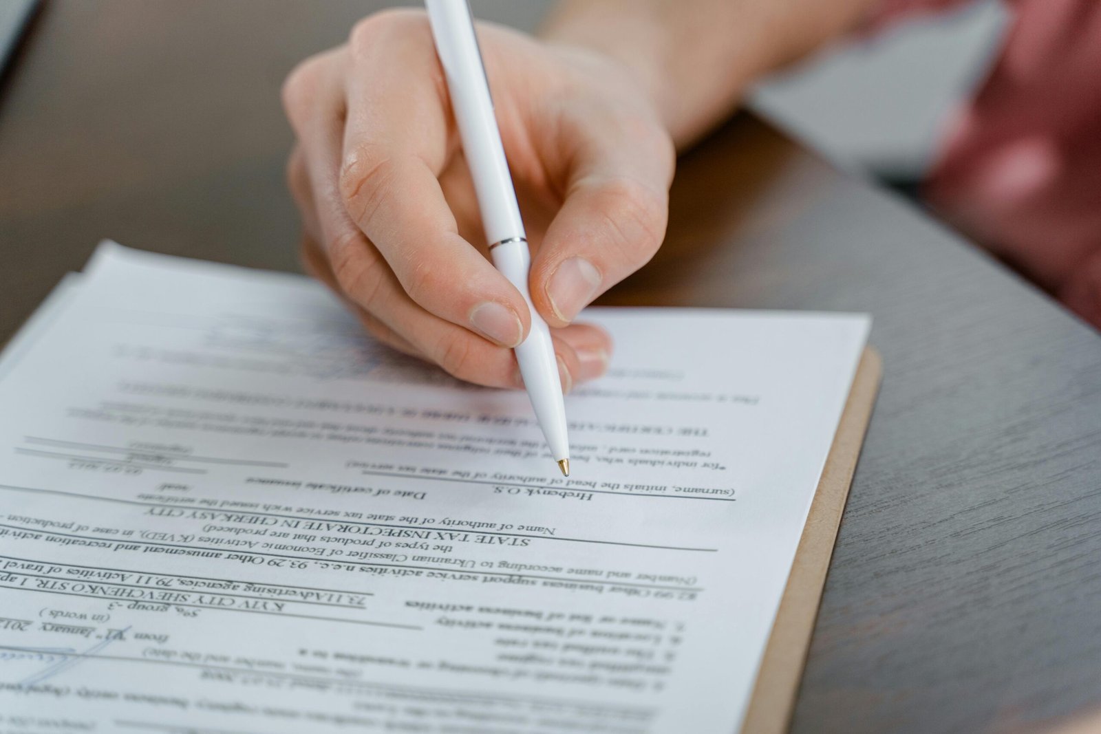 Completing a new client referral form for therapy at Together Works in Leland, NC
