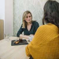 friends-talking-cafe friends-talking-cafe